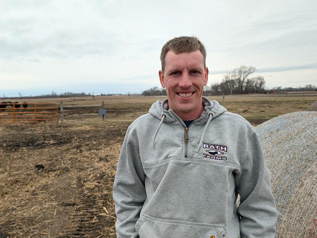 Tyler Rath juggles multiple crops, cattle and family on a farm near Belgrade, Minnesota. (Photo courtesy of Ashley Rath)