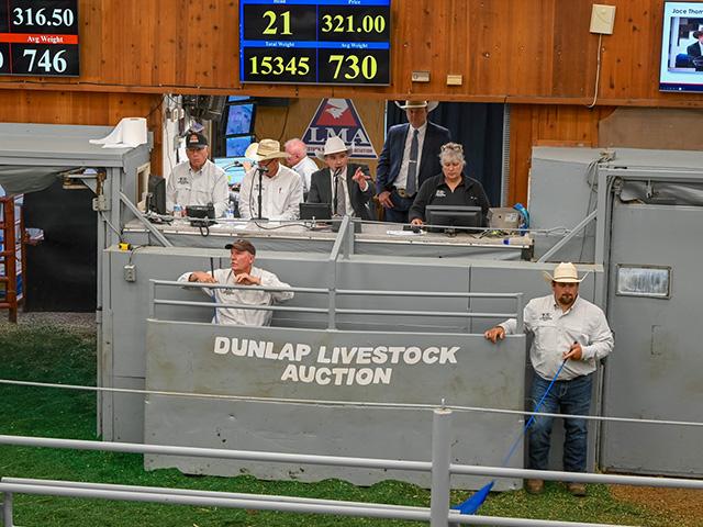 Jace Thompson, of Billings, Montana, was named the 2026 World Livestock Auctioneering Champion during the contest in St. Onge, South Dakota. He is pictured in the center, here, during the 2025 contest in Dunlap, Iowa. (DTN/Progressive Farmer photo by Jennifer Carrico)